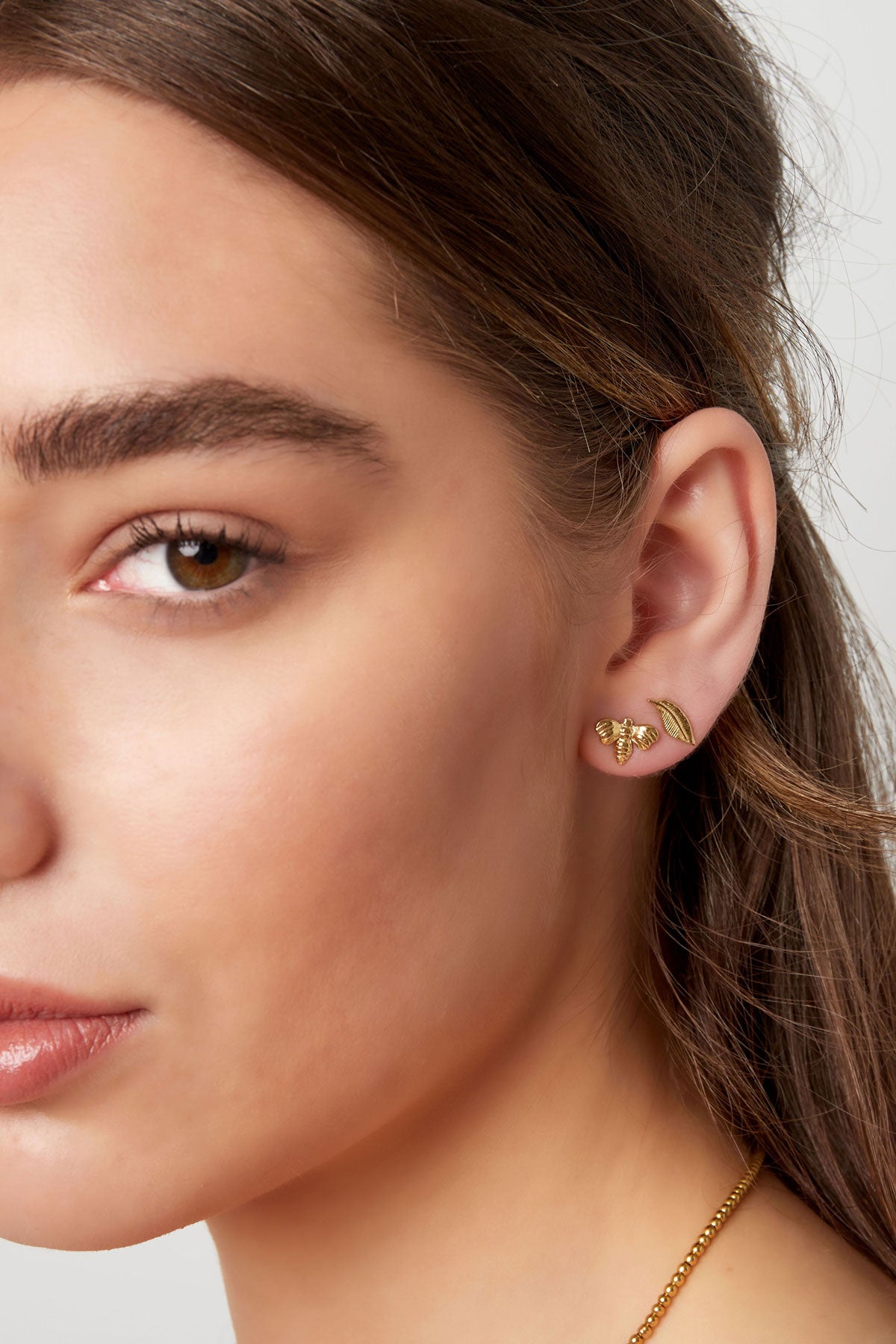 Clous d'oreilles Plume - Doré Acier Inoxydable