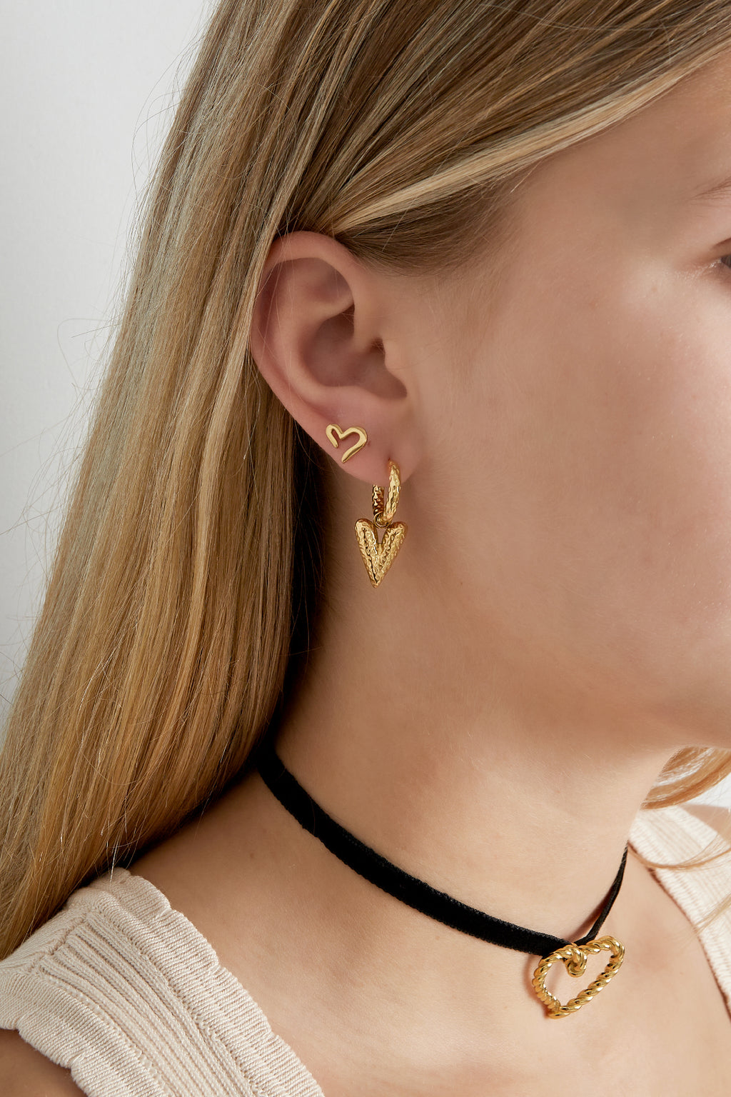Les boucles d'oreilles ouvrent ton cœur