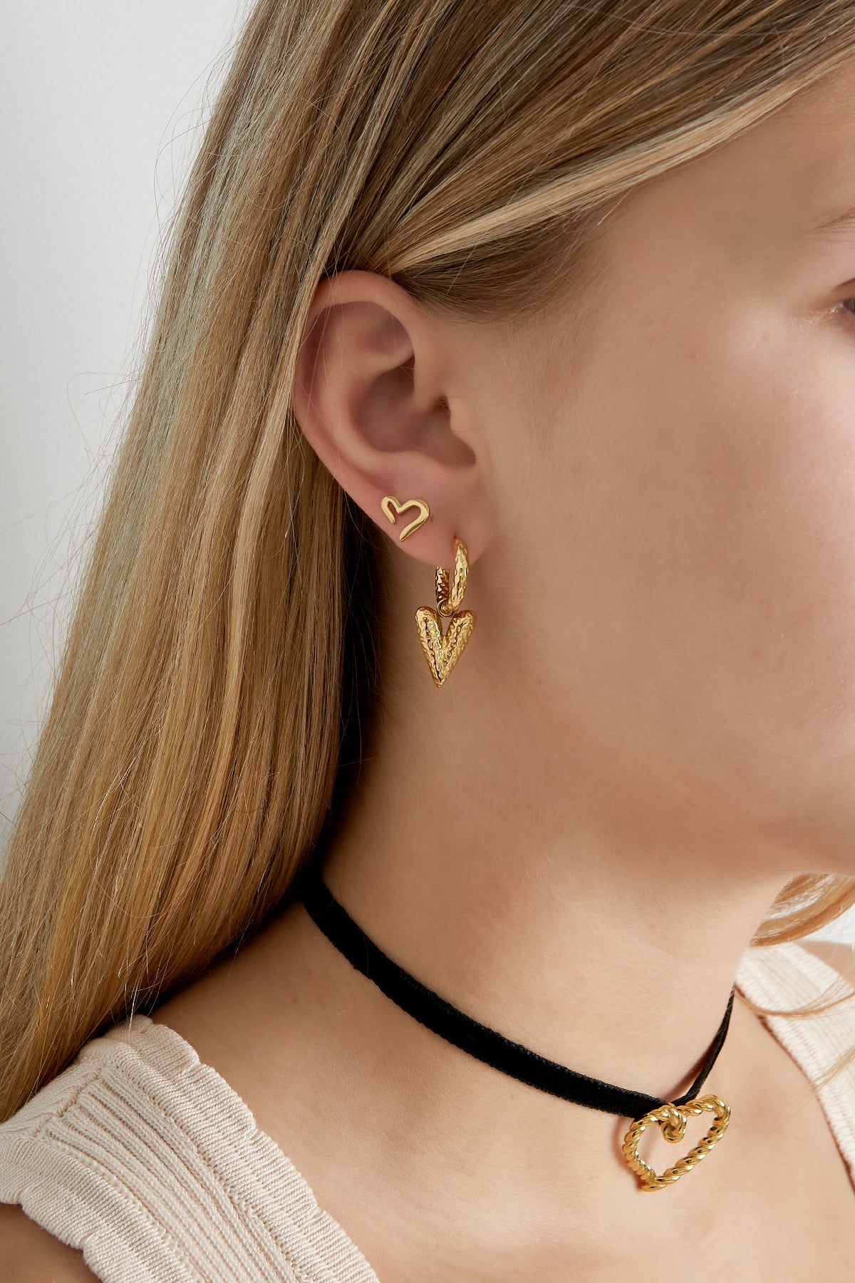 Les boucles d'oreilles ouvrent ton cœur