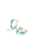 Boucles d'oreilles créoles ornées d'étoiles de mer et de perles dorées