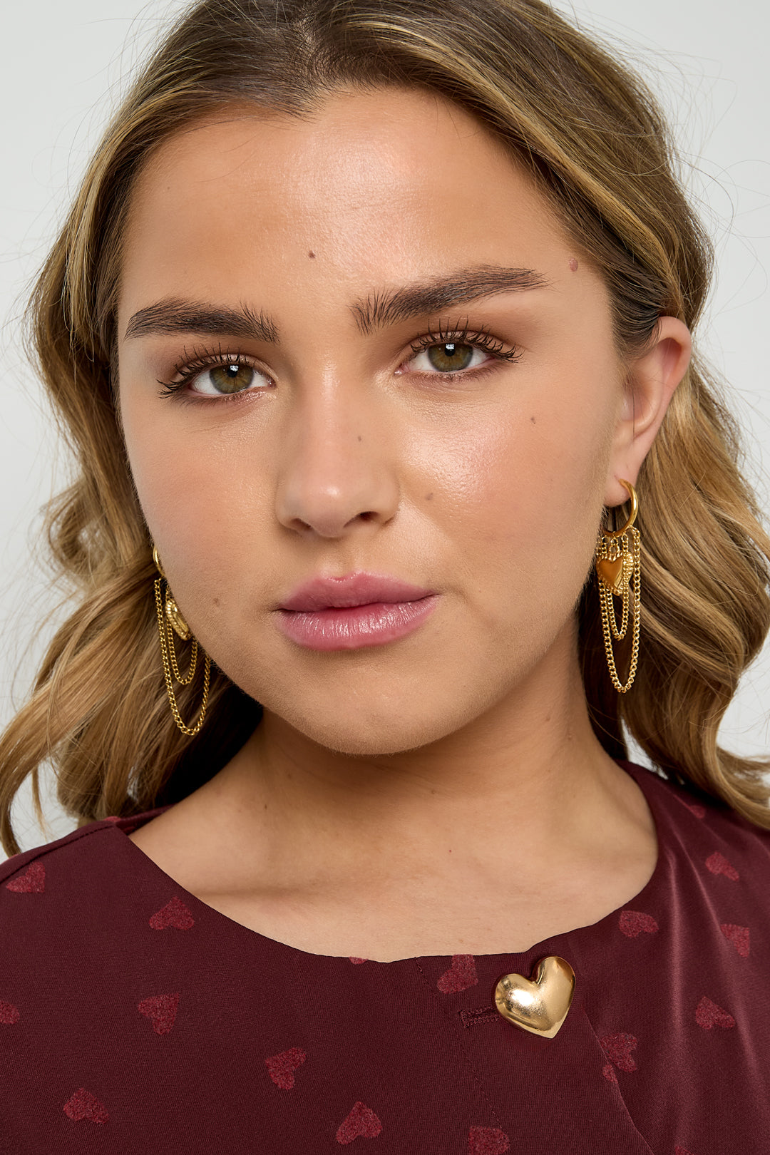 Boucles d'oreilles créoles avec chaînettes et cœur