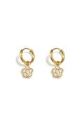 Petites boucles d'oreilles créoles ornées de fleurs pendantes en pierres de zircone