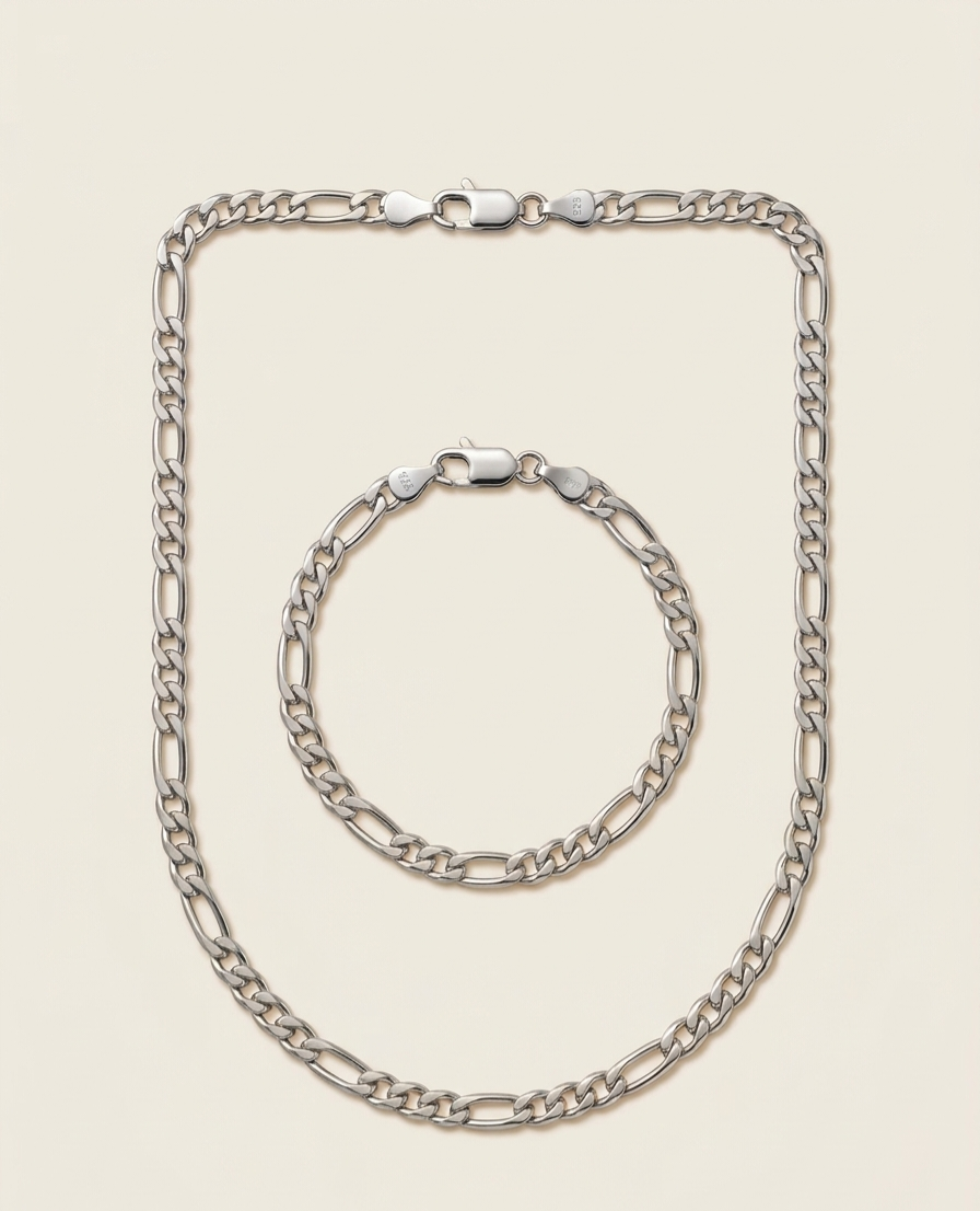 Ensemble unisexe Nexo comprenant un collier et un bracelet maille Figaro en acier inoxydable de couleur argenté