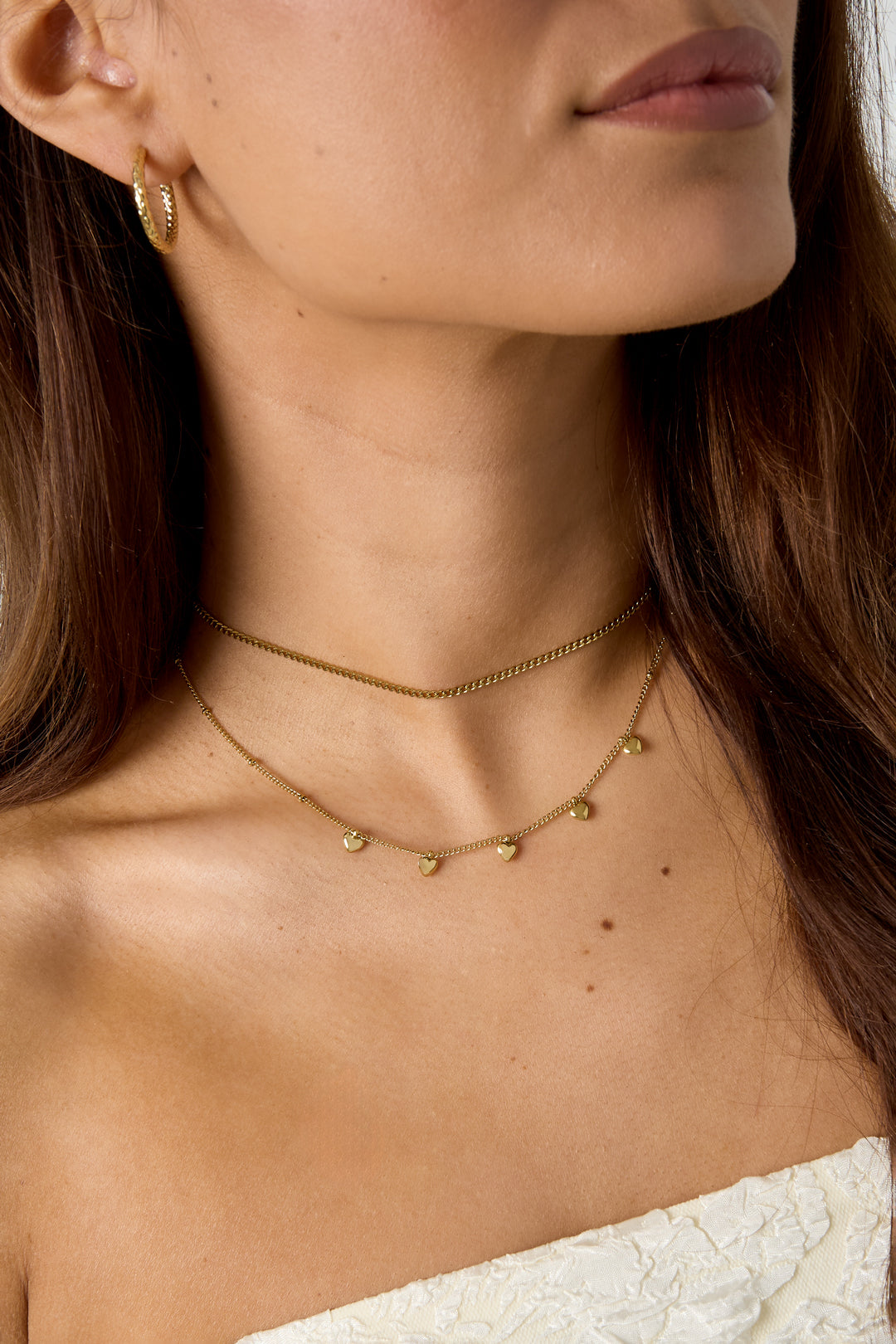 Collier minimaliste à petits cœurs